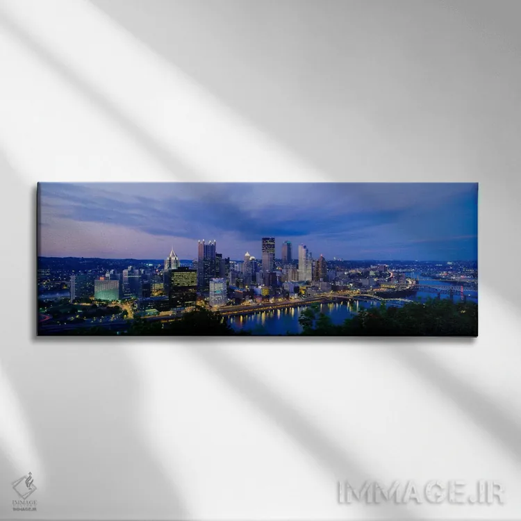 تابلو Monongahela River, Pittsburgh, Pennsylvania, USA" - "ساختمانها که در شب روشن شدهاند، رودخانه مونوگهیلا، پیتسبورگ، پنسیلوانیا، ایالات متحده" اثر پانورامیک ایمجز (استودیو عکاسی عریض) - نمای روبهرو روی دیوار