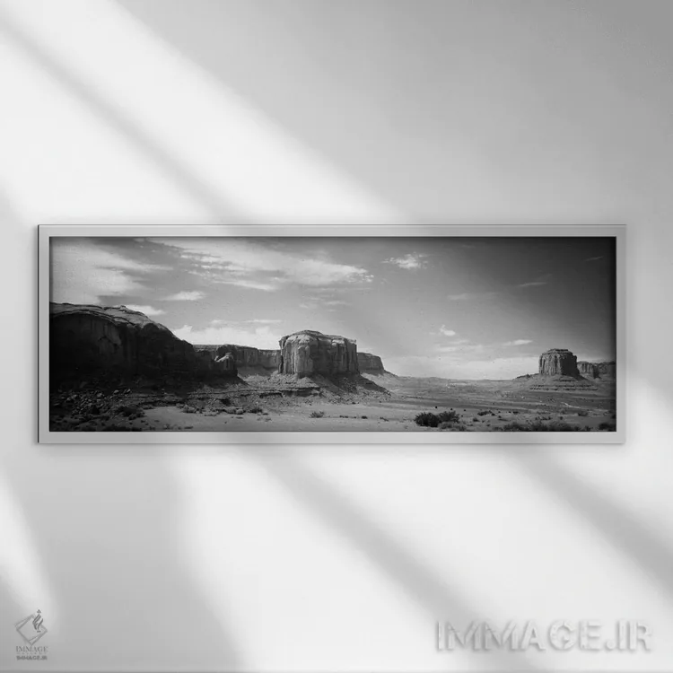 تابلو "منظره بیابانی به صورت سیاه و سفید، دره یادبود، سرزمین ناواهو، ایالات متحده" اثر پانورامیک ایمجز (استودیو عکاسی عریض) - نمای قابدار سفید
