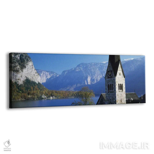 تابلو Hallstatt, Salzkammergut, Austria" - "کلیسا در کنار دریاچه، هالشتات، سالزکامراگوت، اتریش" اثر پانورامیک ایمجز (استودیو عکاسی عریض) - نمای پرسپکتیو محصول