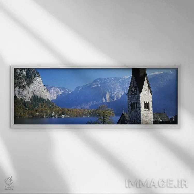 تابلو Hallstatt, Salzkammergut, Austria" - "کلیسا در کنار دریاچه، هالشتات، سالزکامراگوت، اتریش" اثر پانورامیک ایمجز (استودیو عکاسی عریض) - نمای قابدار سفید