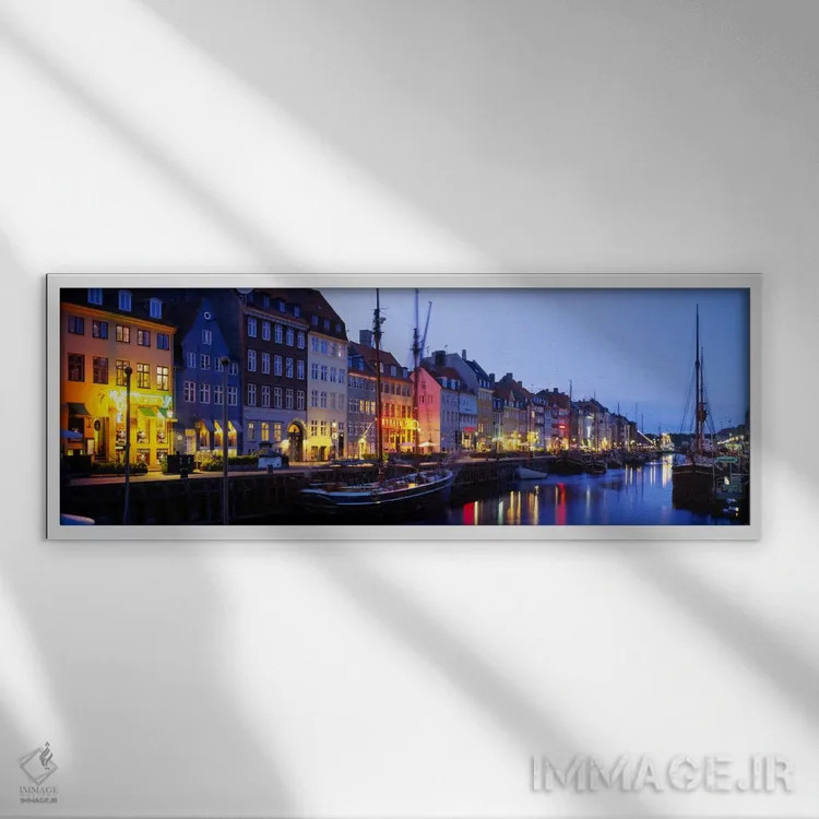 تابلو Nyhavn, Copenhagen, Denmark" - "خانههای کنار آب، نیهاون، کپنهاگ، دانمارک" اثر پانورامیک ایمجز (استودیو عکاسی عریض) - نمای قابدار سفید