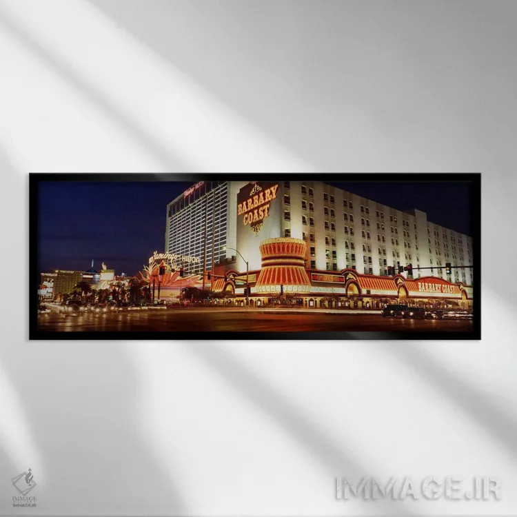 تابلو Nevada, Las Vegas, Buildings lit up at night" - "ایالات متحده آمریکا، نوادا، لاس وگاس، ساختمانها روشن شده در شب" اثر پانورامیک ایمجز (استودیو عکاسی عریض) - نمای قابدار مشکی