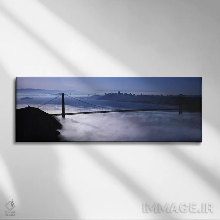 تابلو San Francisco, Fog over Golden Gate Bridge" - "ایالات متحده آمریکا، کالیفرنیا، سانفرانسیسکو، مه روی پل گلدن گیت" اثر پانورامیک ایمجز (استودیو عکاسی عریض) - نمای روبهرو روی دیوار