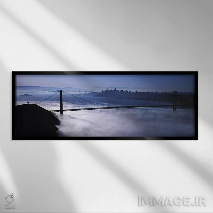 تابلو San Francisco, Fog over Golden Gate Bridge" - "ایالات متحده آمریکا، کالیفرنیا، سانفرانسیسکو، مه روی پل گلدن گیت" اثر پانورامیک ایمجز (استودیو عکاسی عریض) - نمای قابدار مشکی