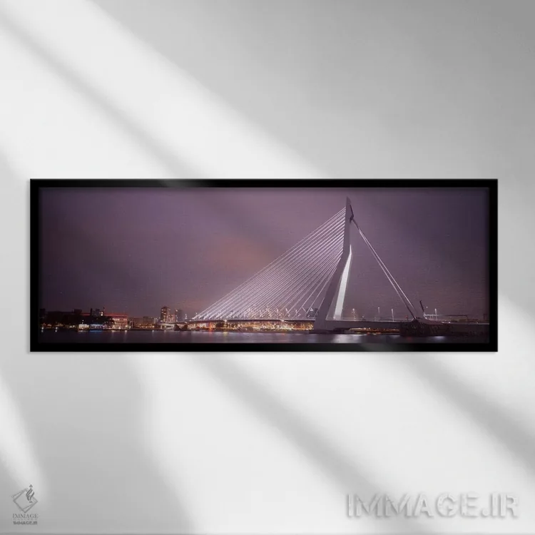 تابلو Rotterdam, Netherlands" - "پل ارسموس روشنشده در شب، روتردام، هلند" اثر پانورامیک ایمجز (استودیو عکاسی عریض) - نمای قابدار مشکی