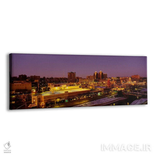 تابلو نمای بالا از ساختمانهایی که در غروب روشن شدهاند، کانزاس سیتی، میزوری، ایالات متحده اثر پانورامیک ایمجز (استودیو عکاسی عریض) - نمای پرسپکتیو محصول