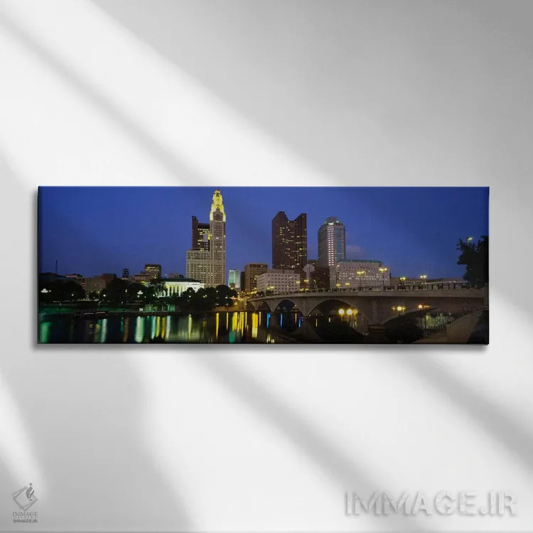 تابلو ساختمانهایی که در شب روشن شدهاند، کلمبوس، رودخانه سیتو، اوهایو، ایالات متحده اثر پانورامیک ایمجز (استودیو عکاسی عریض) - نمای روبهرو روی دیوار