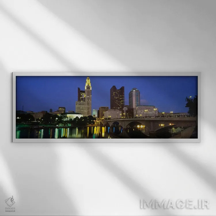 تابلو ساختمانهایی که در شب روشن شدهاند، کلمبوس، رودخانه سیتو، اوهایو، ایالات متحده اثر پانورامیک ایمجز (استودیو عکاسی عریض) - نمای قابدار سفید