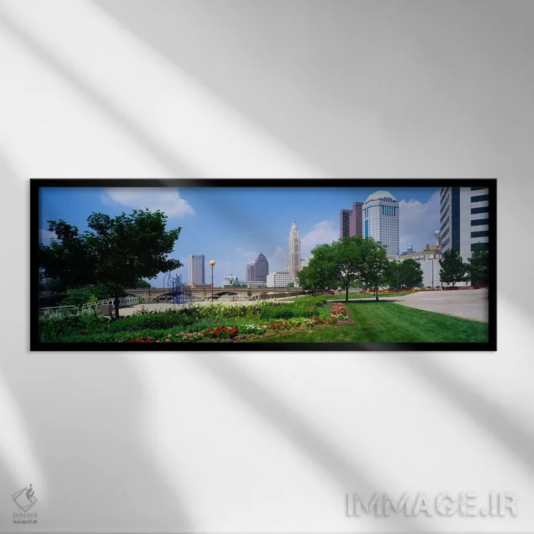 تابلو باغ در مقابل آسمانخراشها در یک شهر، رودخانه سیوتو، کلمبوس، اوهایو، ایالات متحده آمریکا اثر پانورامیک ایمجز (استودیو عکاسی عریض) - نمای قابدار مشکی