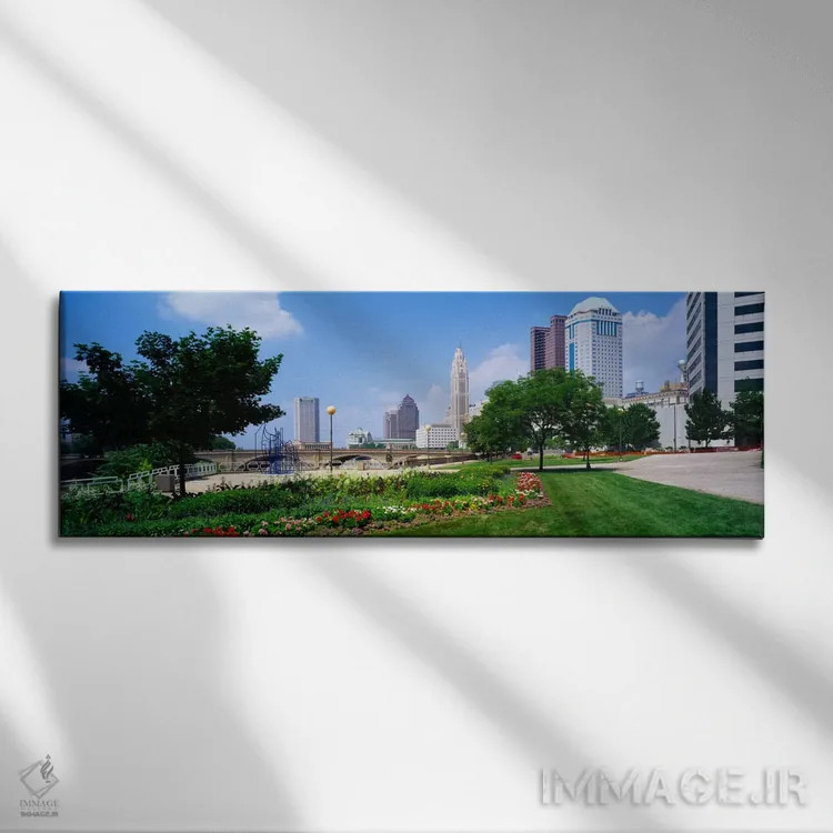 تابلو باغ در مقابل آسمانخراشها در یک شهر، رودخانه سیوتو، کلمبوس، اوهایو، ایالات متحده آمریکا اثر پانورامیک ایمجز (استودیو عکاسی عریض) - نمای روبهرو روی دیوار