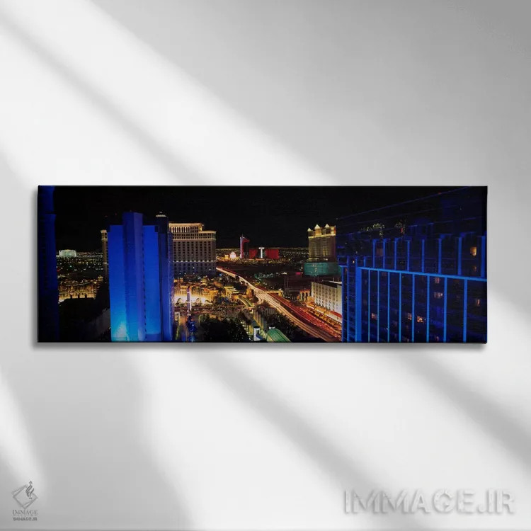تابلو ساختمانهای روشن شده در شب، لاسوگاس، نواد، ایالات متحده آمریکا اثر پانورامیک ایمجز (استودیو عکاسی عریض) - نمای روبهرو روی دیوار