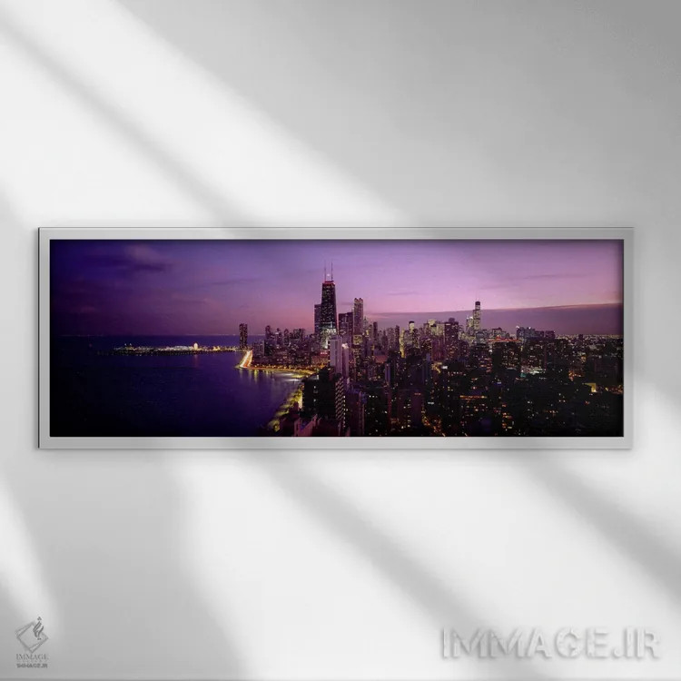 تابلو ساختمانهای روشن شده در شب، شیکاگو، ایلینوی، ایالات متحده آمریکا اثر پانورامیک ایمجز (استودیو عکاسی عریض) - نمای قابدار سفید