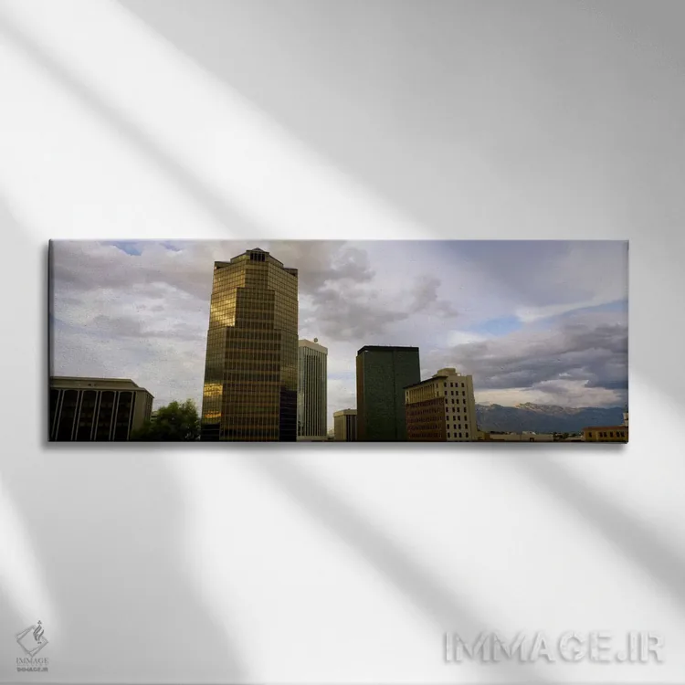 تابلو ساختمانها در یک شهر با کوهها در پسزمینه، توسان، آریزونا، ایالات متحده آمریکا اثر پانورامیک ایمجز (استودیو عکاسی عریض) - نمای روبهرو روی دیوار