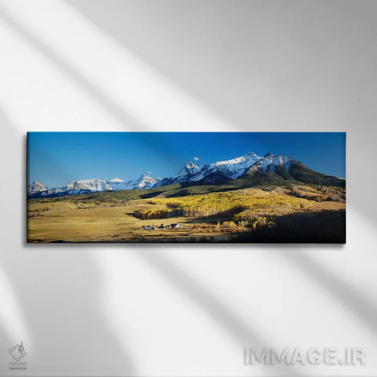 تابلو نمای هوایی از مزرعه آخرین دلار با رشته کوه اسنفلس در پسزمینه، کلرادو، ایالات متحده آمریکا اثر پانورامیک ایمجز (استودیو عکاسی عریض) - نمای روبهرو روی دیوار