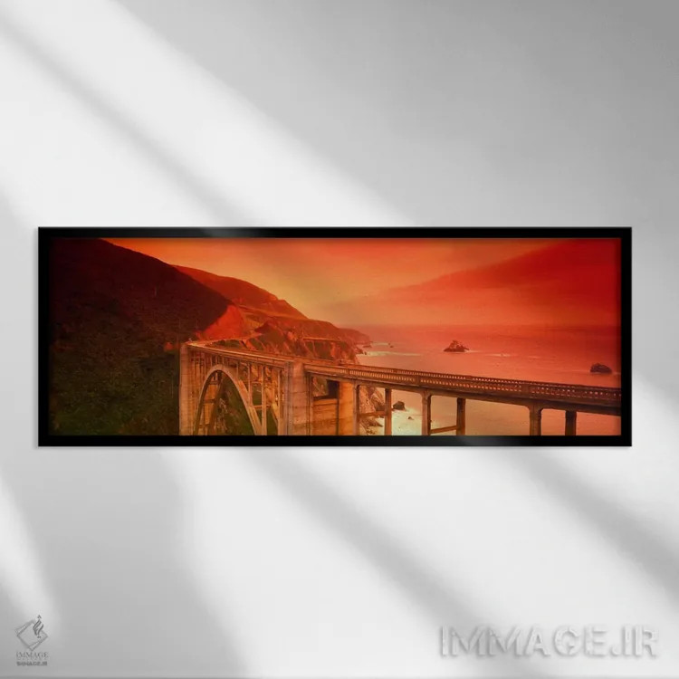 تابلو منظره ساحلی باشکوه با پل بیکسبی کریک، بیگ سور، شهرستان مونتری، کالیفرنیا، آمریکا اثر پانورامیک ایمجز (استودیو عکاسی عریض) - نمای قابدار مشکی
