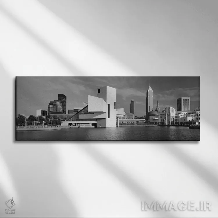 تابلو "ساختمانها در کنار ساحل، سالن مشاهیر راک اند رول، کلیولند، اوهایو، ایالات متحده آمریکا" اثر پانورامیک ایمجز (استودیو عکاسی عریض) - نمای روبهرو روی دیوار