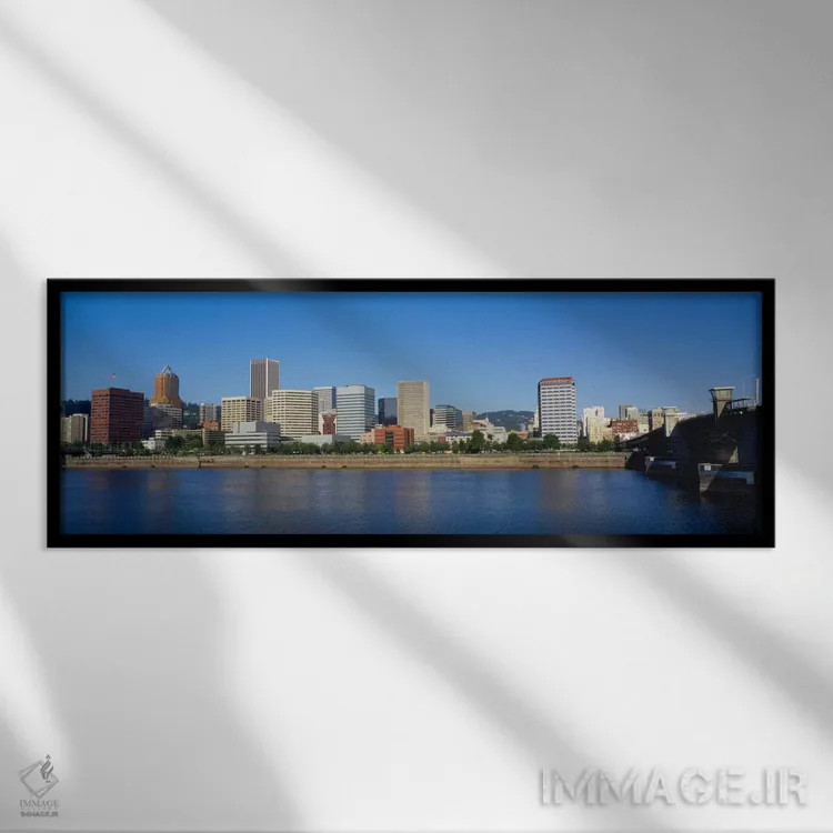 تابلو "ساختمانها در کنار ساحل، پورتلند، اورگن، ایالات متحده آمریکا" اثر پانورامیک ایمجز (استودیو عکاسی عریض) - نمای قابدار مشکی