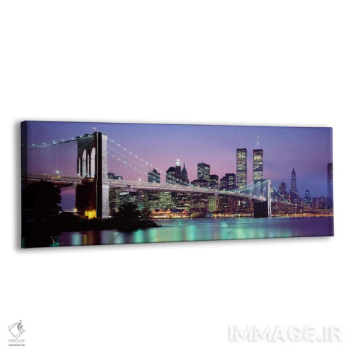تابلو "پل بروکلین روشن شده با نمای افق منطقه مالی منهتن در پسزمینه، نیویورک سیتی، ایالت نیویورک" اثر پانورامیک ایمجز (استودیو عکاسی عریض) - نمای پرسپکتیو محصول