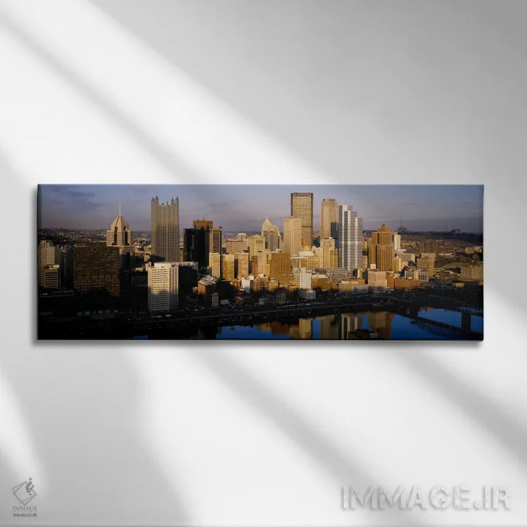 تابلو "بازتاب ساختمانها در رودخانه، رودخانه مونونگههلا، پیتسبورگ، ایالت پنسیلوانیا، ایالات متحده آمریکا" اثر پانورامیک ایمجز (استودیو عکاسی عریض) - نمای روبهرو روی دیوار