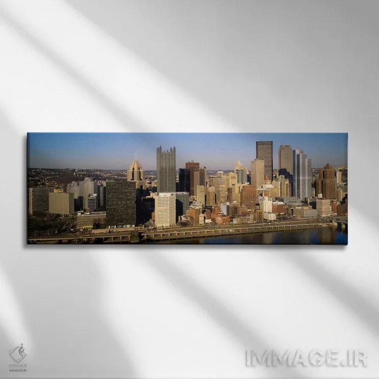 تابلو "نمای بالای ساختمانها در یک شهر، پیتسبورگ، ایالت پنسیلوانیا، ایالات متحده آمریکا" اثر پانورامیک ایمجز (استودیو عکاسی عریض) - نمای روبهرو روی دیوار