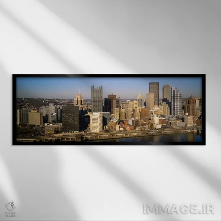 تابلو "نمای بالای ساختمانها در یک شهر، پیتسبورگ، ایالت پنسیلوانیا، ایالات متحده آمریکا" اثر پانورامیک ایمجز (استودیو عکاسی عریض) - نمای قابدار مشکی