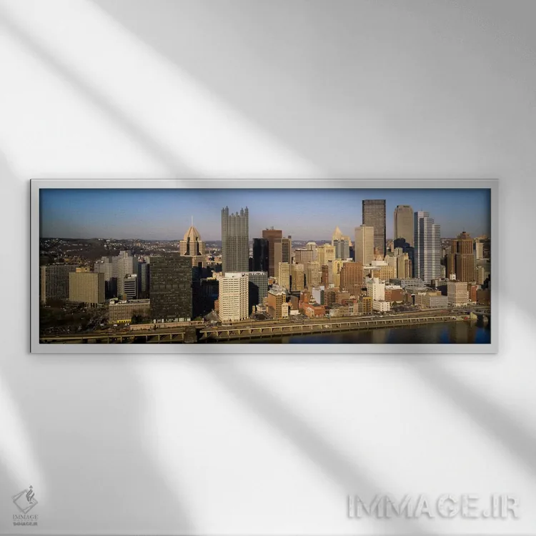 تابلو "نمای بالای ساختمانها در یک شهر، پیتسبورگ، ایالت پنسیلوانیا، ایالات متحده آمریکا" اثر پانورامیک ایمجز (استودیو عکاسی عریض) - نمای قابدار سفید