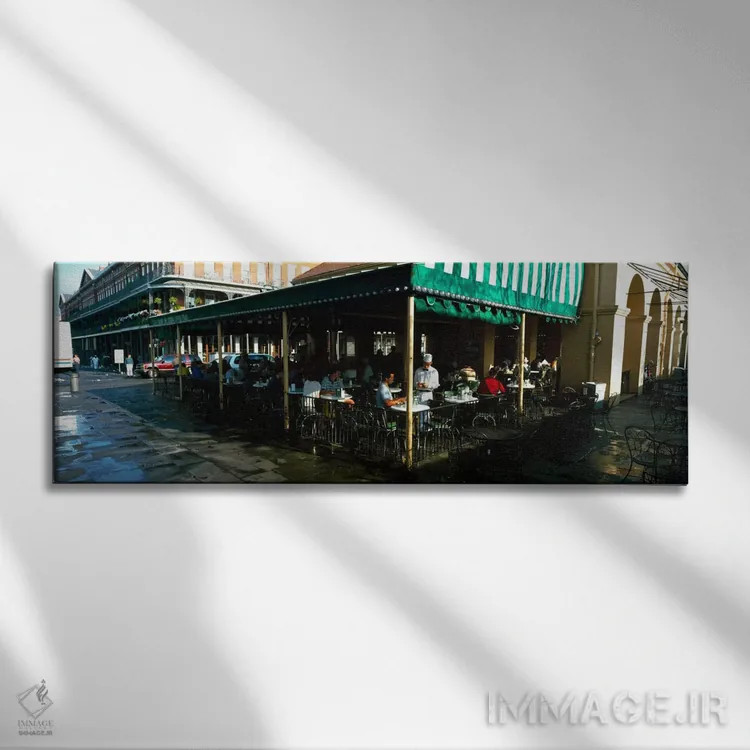 تابلو "گردشگران در یک کافیشاپ، کافه دو موند، خیابان دکاتور، محله فرانسه، نیواورلئان، لوئیزیانا، ایالات متحده آمریکا" اثر پانورامیک ایمجز (استودیو عکاسی عریض) - نمای روبهرو روی دیوار