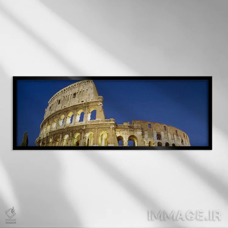 تابلو Rome, Lazio, Italy,نمای از زاویه پایین به ویرانههای یک آمفیتئاتر، کولوسئوم، رم، لاتزیو، ایتالیا اثر پانورامیک ایمجز (استودیو عکاسی عریض) - نمای قابدار مشکی