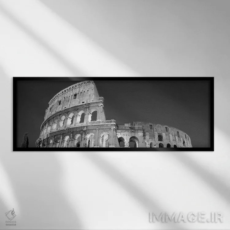 تابلو Coliseum, Rome, Lazio, Italy (black & white),نمای از زاویه پایین به ویرانههای آمفیتئاتر کولوسئوم، رم، لاتزیو، ایتالیا (سیاه و سفید) اثر پانورامیک ایمجز (استودیو عکاسی عریض) - نمای قابدار مشکی