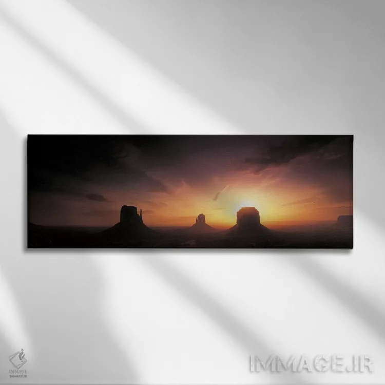 تابلو Monument Valley, Navajo Nation, USA,غروب ابری بر فراز میتنز و مریک بیوت، دره مونومنت، ملت ناواهو، آمریکا اثر پانورامیک ایمجز (استودیو عکاسی عریض) - نمای روبهرو روی دیوار