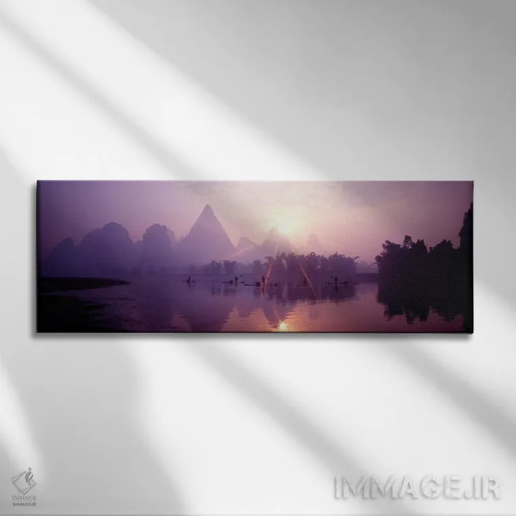 تابلو Li River, Guilin, Guangxi Zhuang Autonomous Region, China,ماهیگیری در اولین نور صبح، رود لی، گویلین، منطقه خودمختار گوانگشی ژوانگ، چین اثر پانورامیک ایمجز (استودیو عکاسی عریض) - نمای روبهرو روی دیوار