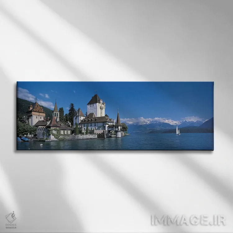 تابلو قلعه اوبرهوفن با دریاچه تون، سوئیس اثر پانورامیک ایمجز (استودیو عکاسی عریض) - نمای روبهرو روی دیوار