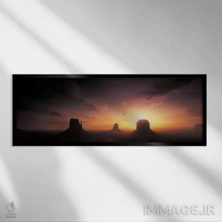 تابلو Monument Valley, Navajo Nation, USA,غروب ابری بر فراز میتنز و مریک بیوت، دره مونومنت، ملت ناواهو، آمریکا اثر پانورامیک ایمجز (استودیو عکاسی عریض) - نمای قابدار مشکی