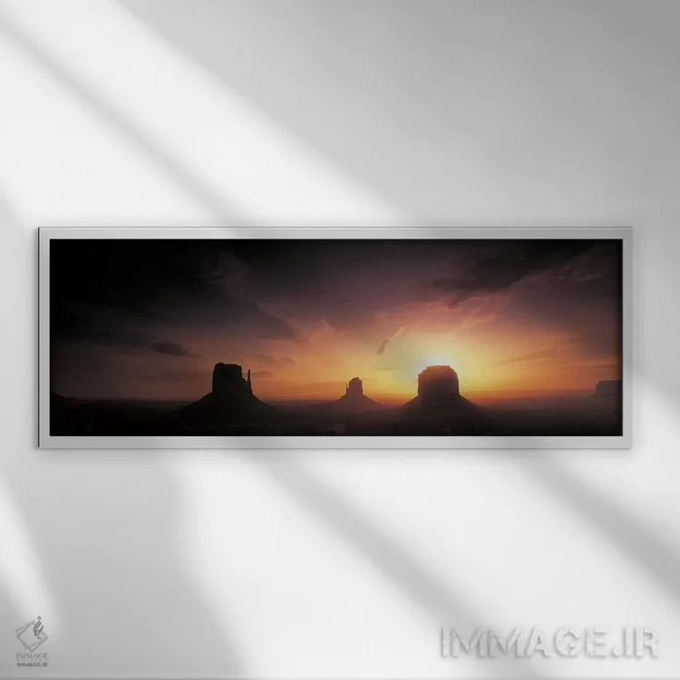 تابلو Monument Valley, Navajo Nation, USA,غروب ابری بر فراز میتنز و مریک بیوت، دره مونومنت، ملت ناواهو، آمریکا اثر پانورامیک ایمجز (استودیو عکاسی عریض) - نمای قابدار سفید