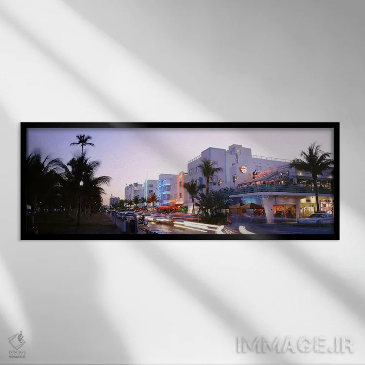 تابلو Ocean Drive, Miami, Florida, USA,ساختمانهای روشنشده در غروب، اوشن درایو، میامی، فلوریدا، آمریکا اثر پانورامیک ایمجز (استودیو عکاسی عریض) - نمای قابدار مشکی
