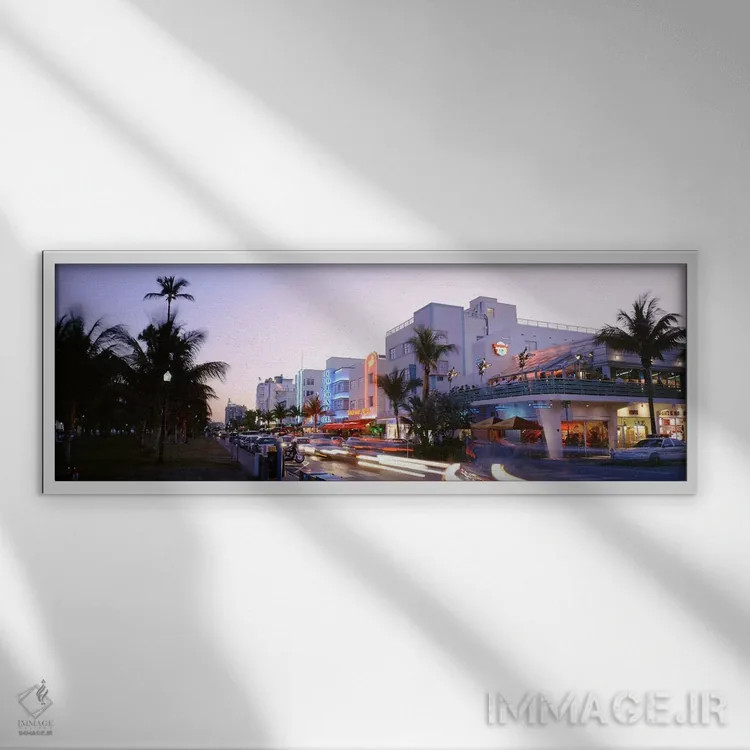 تابلو Ocean Drive, Miami, Florida, USA,ساختمانهای روشنشده در غروب، اوشن درایو، میامی، فلوریدا، آمریکا اثر پانورامیک ایمجز (استودیو عکاسی عریض) - نمای قابدار سفید