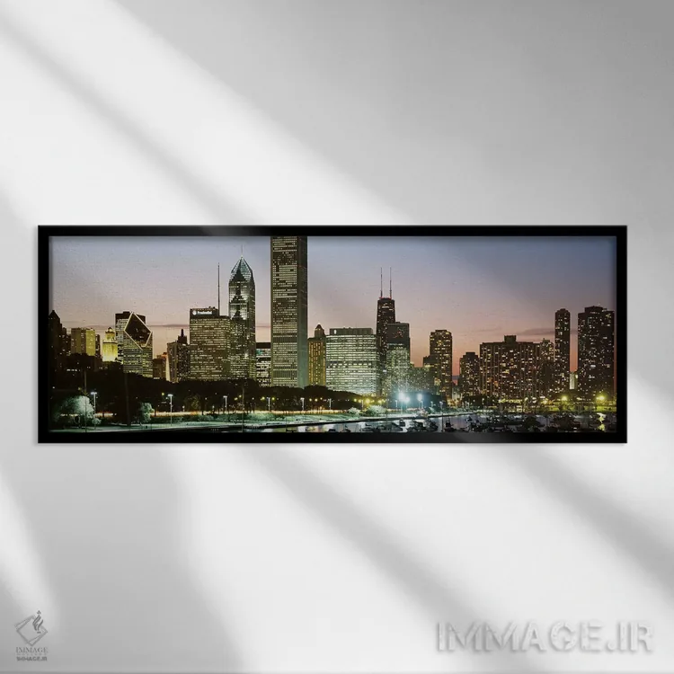 تابلو Chicago, Cook County, Illinois, USA,ساختمانهای روشنشده در شب، شیکاگو، کوک کانتی، ایلینوی، آمریکا اثر پانورامیک ایمجز (استودیو عکاسی عریض) - نمای قابدار مشکی