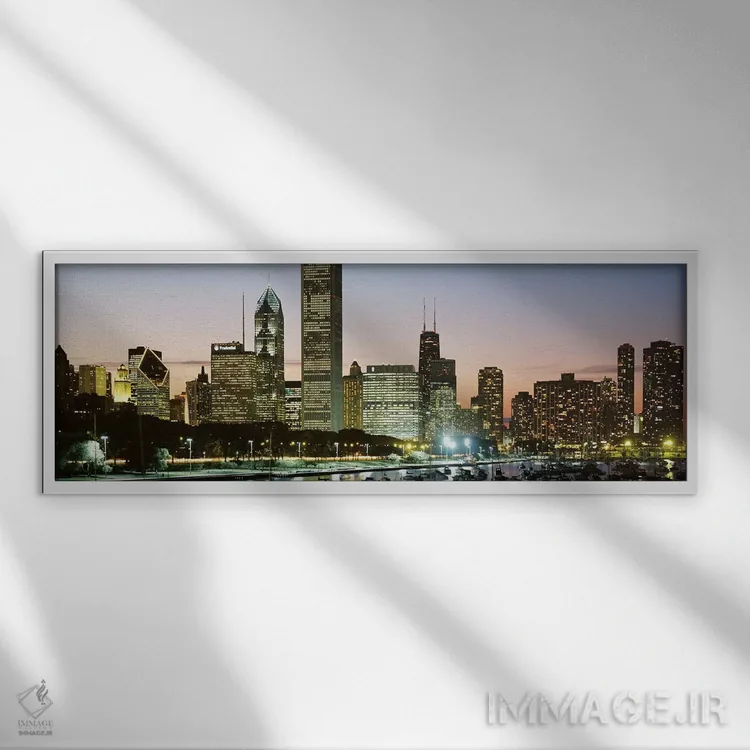 تابلو Chicago, Cook County, Illinois, USA,ساختمانهای روشنشده در شب، شیکاگو، کوک کانتی، ایلینوی، آمریکا اثر پانورامیک ایمجز (استودیو عکاسی عریض) - نمای قابدار سفید