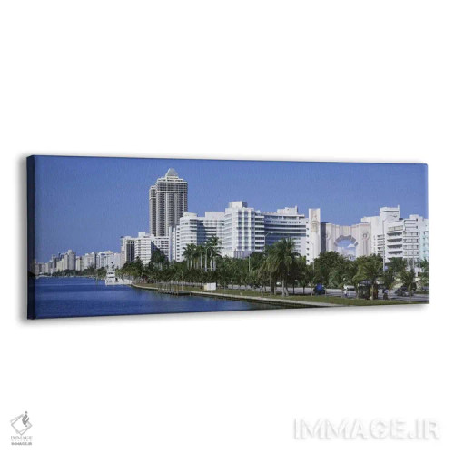 تابلو Miami, Miami Beach, Panoramic view of waterfront, & skyline,ایالات متحده آمریکا، فلوریدا، میامی، ساحل میامی، نمای پانوراما از ساحل و افق شهری اثر پانورامیک ایمجز (استودیو عکاسی عریض) - نمای پرسپکتیو محصول