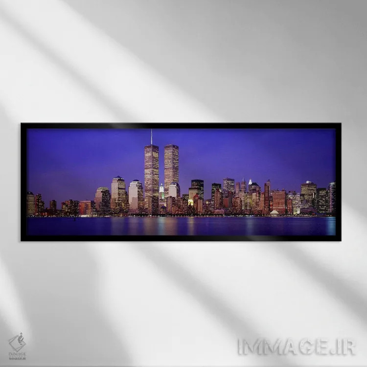 تابلو World Trade Center, Wall Street, Manhattan, New York City, New York State, USA,ساختمانهای ساحلی روشن در غروب، مرکز تجارت جهانی و وال استریت، منهتن، نیویورک، آمریکا اثر پانورامیک ایمجز (استودیو عکاسی عریض) - نمای قابدار مشکی
