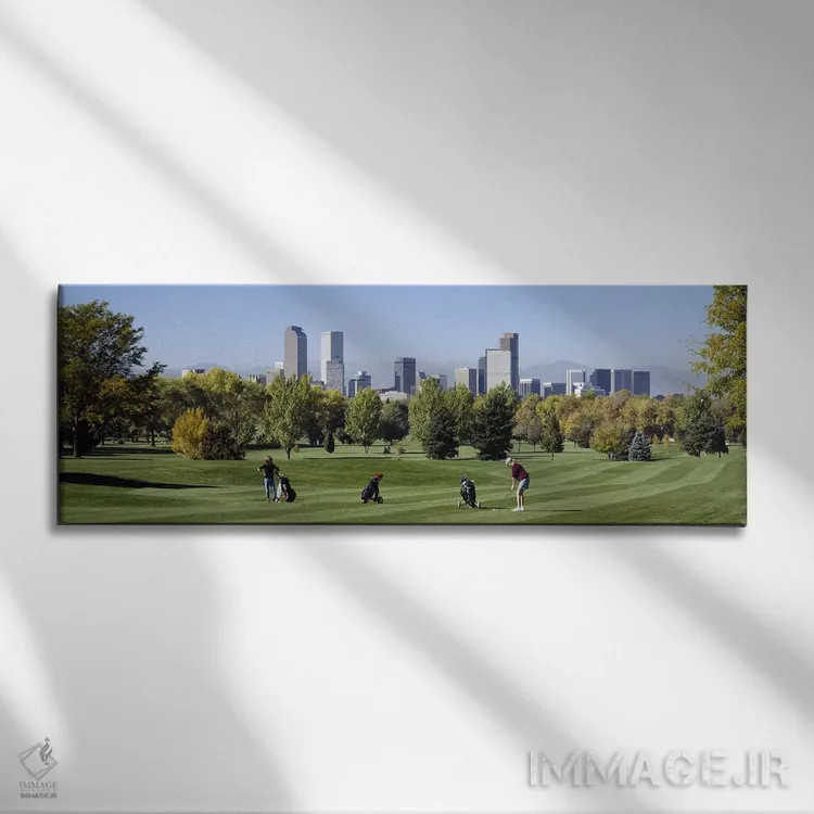 تابلو Denver, Colorado, USA,چهار نفر در حال بازی گلف با ساختمانهای پسزمینه، دنور، کلرادو، آمریکا اثر پانورامیک ایمجز (استودیو عکاسی عریض) - نمای روبهرو روی دیوار