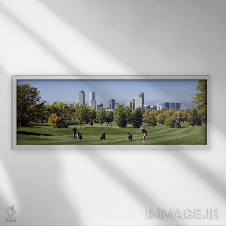 تابلو Denver, Colorado, USA,چهار نفر در حال بازی گلف با ساختمانهای پسزمینه، دنور، کلرادو، آمریکا اثر پانورامیک ایمجز (استودیو عکاسی عریض) - نمای قابدار سفید
