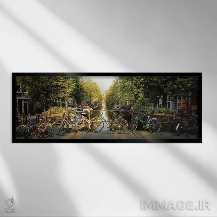 تابلو Amsterdam, Netherlands,ردیفی از دوچرخهها، آمستردام، هلند اثر پانورامیک ایمجز (استودیو عکاسی عریض) - نمای قابدار مشکی