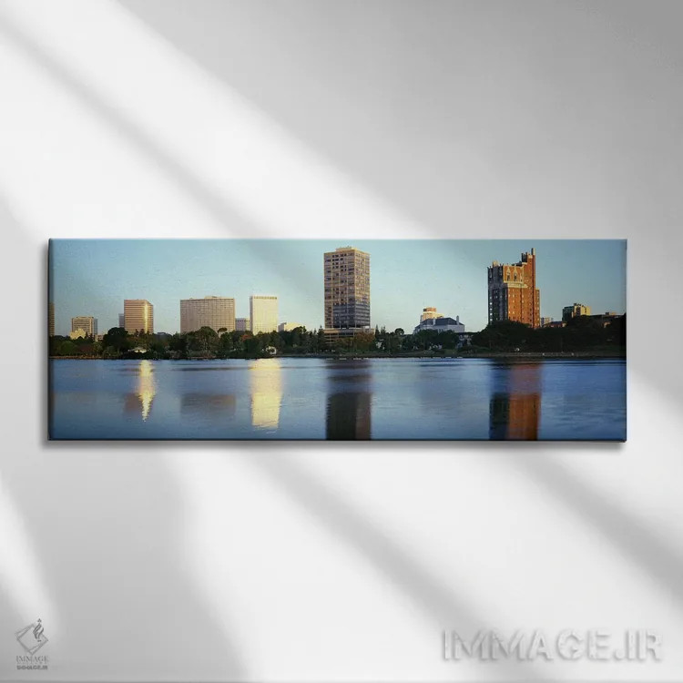 تابلو Lake Merritt, Oakland, California, USA,انعکاس آسمانخراشها در دریاچه، دریاچه مریت، اوکلند، کالیفرنیا، آمریکا اثر پانورامیک ایمجز (استودیو عکاسی عریض) - نمای روبهرو روی دیوار