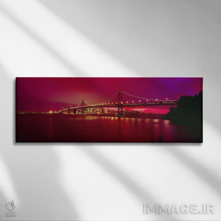 تابلو San Francisco, California, USA,پل معلق روشن در شب (پل بیبریج)، سانفرانسیسکو، کالیفرنیا، آمریکا اثر پانورامیک ایمجز (استودیو عکاسی عریض) - نمای روبهرو روی دیوار