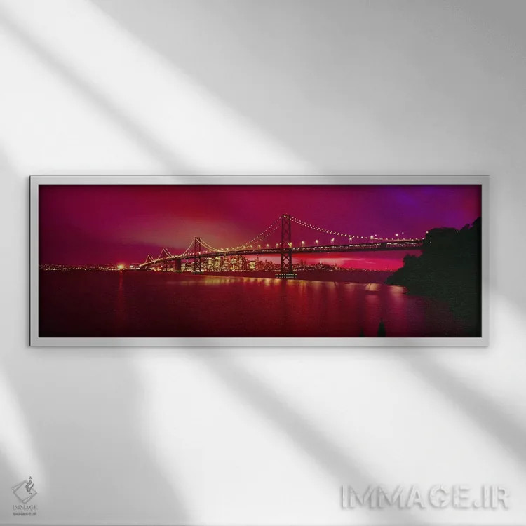 تابلو San Francisco, California, USA,پل معلق روشن در شب (پل بیبریج)، سانفرانسیسکو، کالیفرنیا، آمریکا اثر پانورامیک ایمجز (استودیو عکاسی عریض) - نمای قابدار سفید