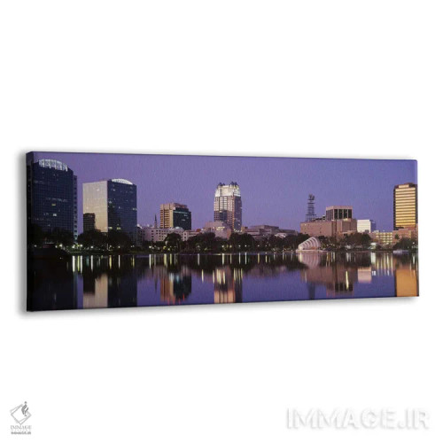 تابلو Lake Eola, Orlando, Florida, USA,ساختمانهای اداری کنار دریاچه، دریاچه ایولا، اورلاندو، فلوریدا، آمریکا اثر پانورامیک ایمجز (استودیو عکاسی عریض) - نمای پرسپکتیو محصول