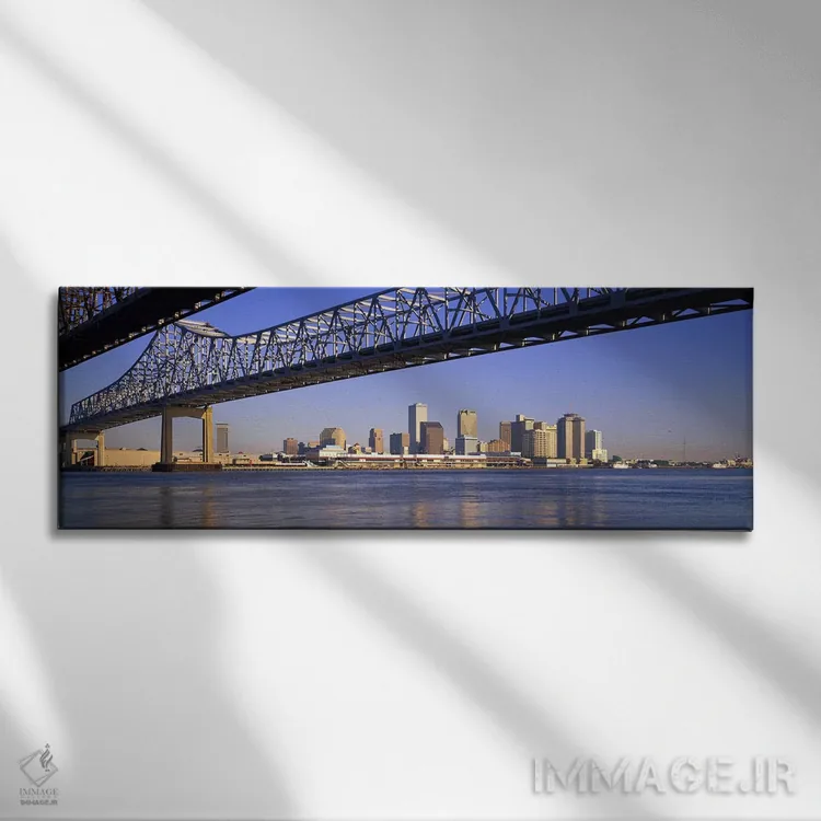 تابلو Crescent City Connection Bridge, Mississippi River, New Orleans, Louisiana, USA,نمای زاویه پایین از پلها بر فراز رودخانه، پل کرسنت سیتی کانکشن، رودخانه میسیسیپی، نیواورلئان، لوئیزیانا، آمریکا اثر پانورامیک ایمجز (استودیو عکاسی عریض) - نمای