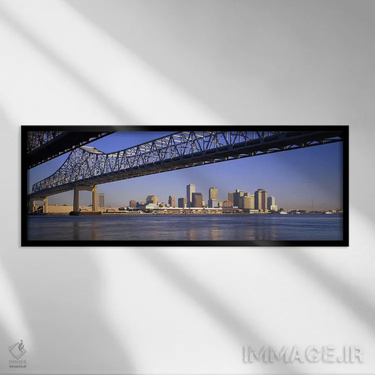 تابلو Crescent City Connection Bridge, Mississippi River, New Orleans, Louisiana, USA,نمای زاویه پایین از پلها بر فراز رودخانه، پل کرسنت سیتی کانکشن، رودخانه میسیسیپی، نیواورلئان، لوئیزیانا، آمریکا اثر پانورامیک ایمجز (استودیو عکاسی عریض) - نمای