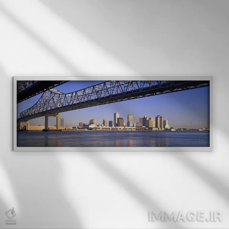 تابلو Crescent City Connection Bridge, Mississippi River, New Orleans, Louisiana, USA,نمای زاویه پایین از پلها بر فراز رودخانه، پل کرسنت سیتی کانکشن، رودخانه میسیسیپی، نیواورلئان، لوئیزیانا، آمریکا اثر پانورامیک ایمجز (استودیو عکاسی عریض) - نمای